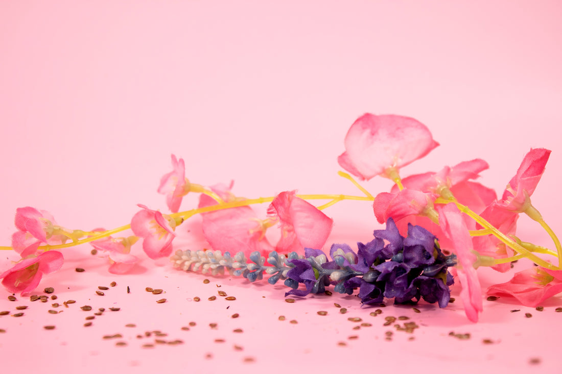 Image of key ingredients used in Reclaim Your Crown products; flaxseed and lavender